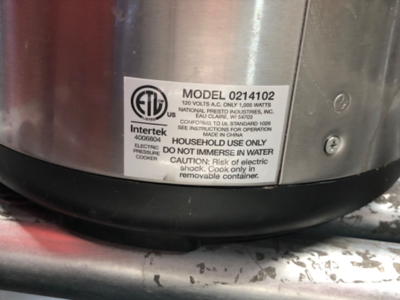 Photo 5 of ***HEAVILY USED AND DIRTY - POWERS ON - UNABLE TO TEST FURTHER***
Presto 02141 6-Quart Electric Pressure Cooker, Black, Silver, Stainless steel