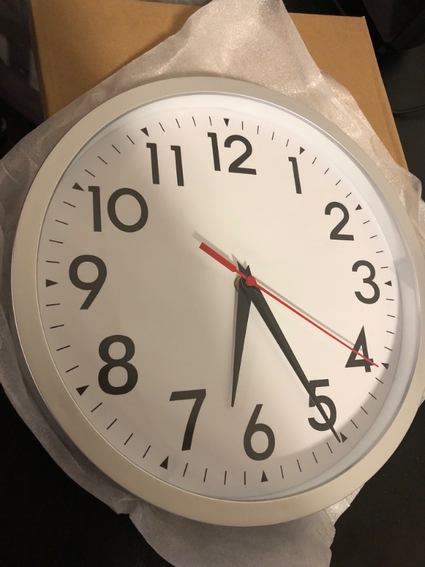 Photo 1 of  wall clock - silver - size 12 " 