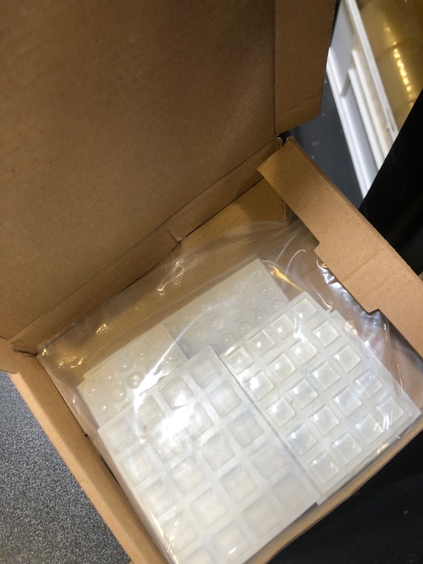 Photo 1 of Amazon Basics 300-Piece Clear Self Adhesive Rubber Bumpers Pads, 6.9 x 4.5 x 0.6 Inch