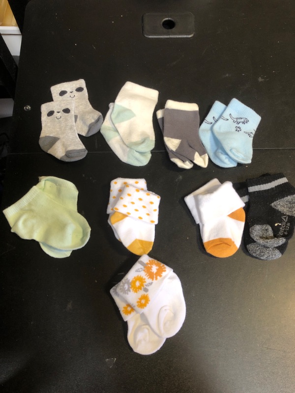 Photo 1 of BABY SOCKS 9 PAIRS (SLIGHLTY USED)