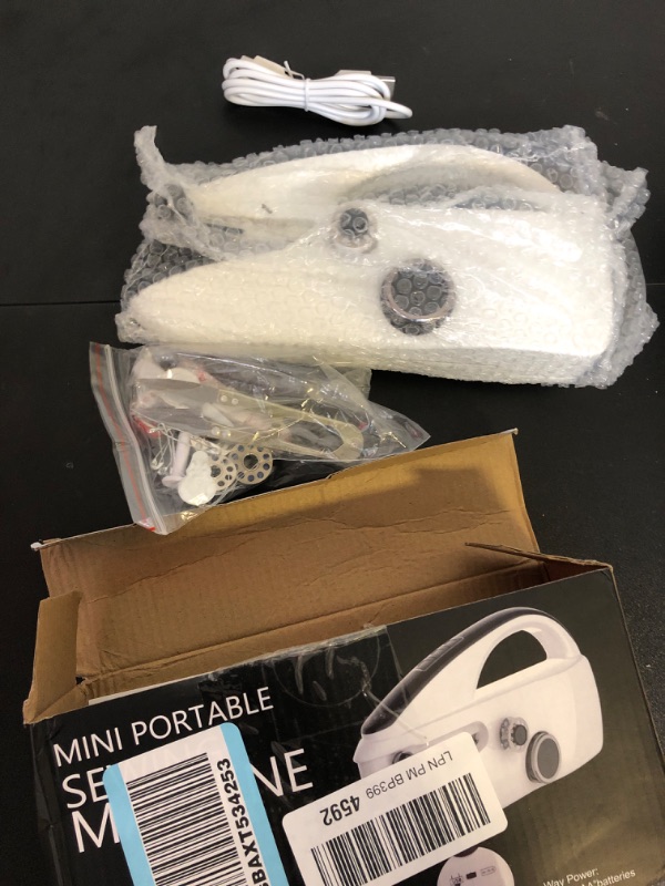 Photo 1 of Mini Portable Sewing Machine
