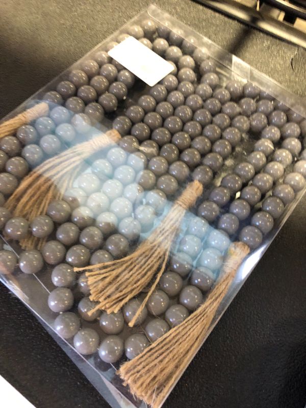 Photo 1 of DECORKEY Farmhouse Wood Beads Garland Decor, 58 Inch Wooden Beads for Boho Home Decor with Tassels, Rustic Country Decor for Table, Wall, Shelf, Tray, Vase, Bedroom, Living Room, Summer(Grey)
