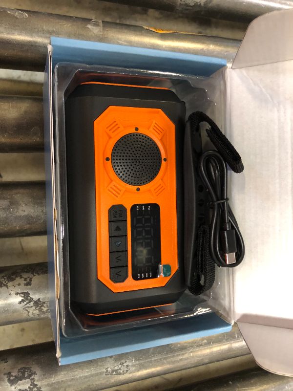 Photo 2 of 12000mAh Hand Crank Emergency Radio, AM/FM/NOAA Weather Radio, Emergency Radio,Multi-Function Solar Powered Radio,2 Solar Panels,USB Type-C Charging,Torch & LED Reading Lamp,SOS Alarm,Compass(Orange)