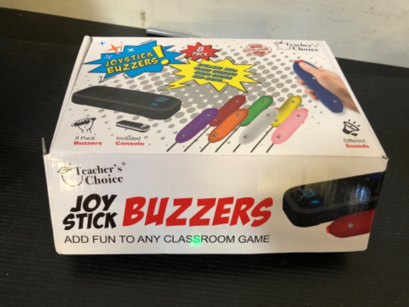 Photo 1 of  Teacher's Choice 8 Color Handheld Buzzer Game System - Console Displays First Buzz-in - Great for Jeopardy, Family Feud, Trivia and Buzzer Games - Controller with 8 Joystick Buzzers, 8 Unique Sounds
