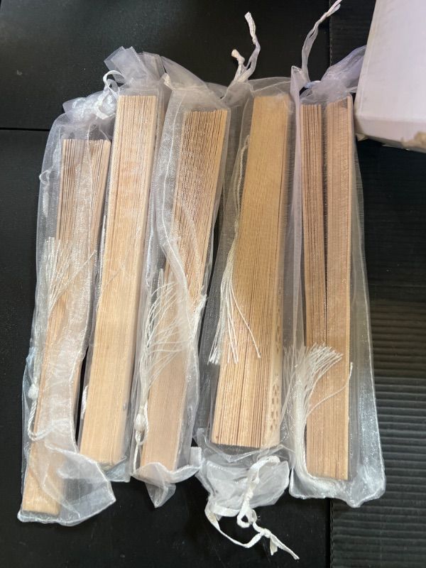 Photo 1 of 5 PCS Sandalwood Fan Wooden Folding Fan with Gift Bags and Tassels Sunflower Hand Fans for Weddings Birthday Christmas Baby Shower Party Favors Supplies