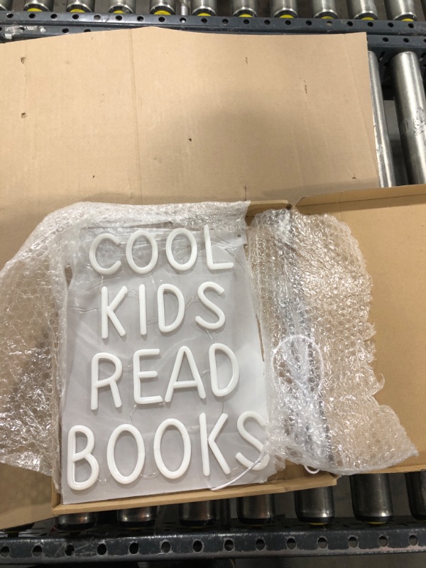 Photo 1 of Cool Kids Read Books Neon Sign for Wall Decor Books Light Up Neon Signs Read Corner Decor for Library Classroom Bedroom