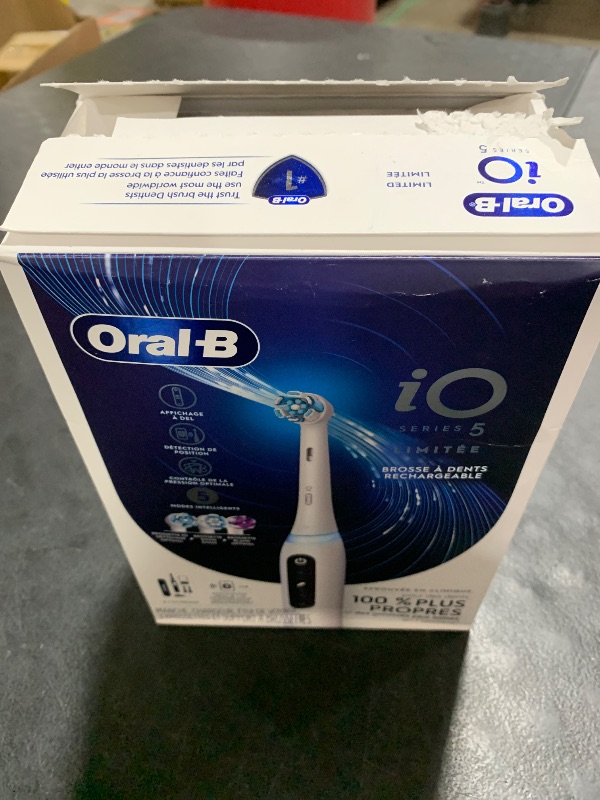 Photo 1 of Oral-B iO Deep Clean + Whiten Rechargeable Electric Toothbrush with Visible Pressure Sensor, 2 Minute Timer, 5 Cleaning Settings, 1 iO5 Limited, 3 Toothbrush Heads, Travel Case & Refill Holder, White