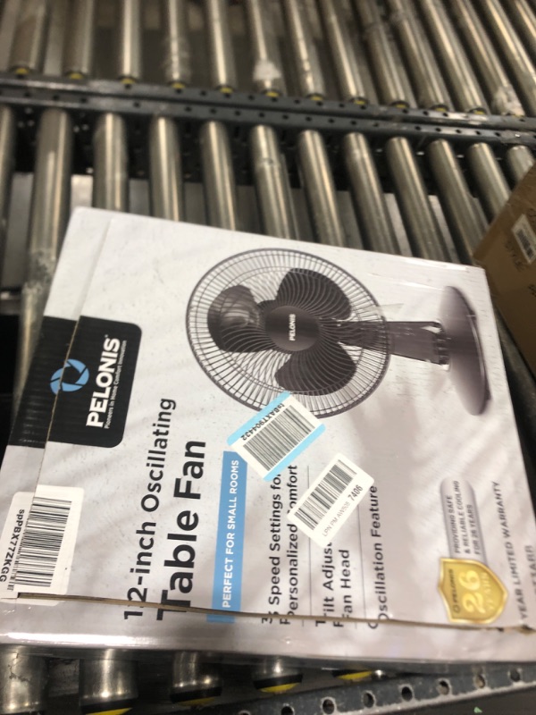 Photo 1 of PELONIS Table Fan 12-Inch, 120° Oscillating Table Fan Small Portable Electric Plug-In Desk Fan with 3-Speeds, 126° Adjustable Tilt Head for Bedroom and Office Black