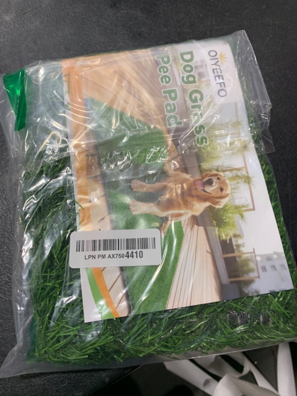 Photo 1 of Oiyeefo Artificial Pee Grass Pad for Dogs, Fake Grass Replacement Pads for Dog Potty Tray Training Pet Turf, Indoor and Outdoor Mat- 2 Packs (14" x 18")