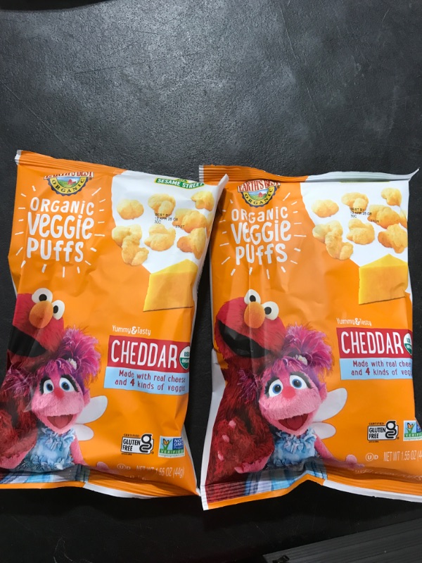 Photo 1 of 2 PACK Earth's Best Organic Kids Snacks, Sesame Street Toddler Snacks, Organic Cheddar Veggie Puffs, Gluten Free Snacks for Kids 2 Years and Older, Cheddar, 1.55 oz Bag