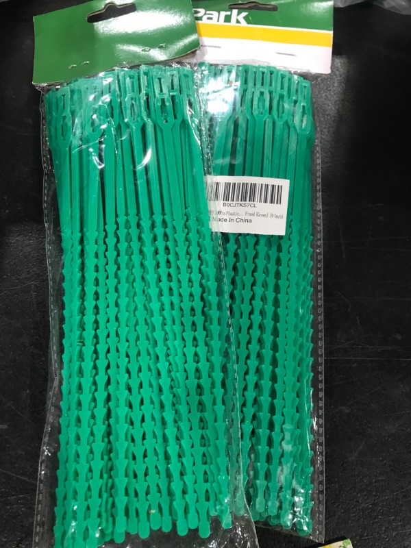 Photo 2 of SAIGREEN 100Pcs 9 Inch Plastic Twist Ties, Adjustable Garden Plant Twist Ties Multi-Use Wire Ties for Vine Vegetable Plant Fixed (Green) 2 packs 