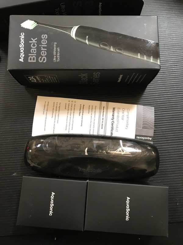 Photo 2 of Aquasonic Black Series Ultra Whitening Toothbrush – ADA Accepted Electric Toothbrush- 8 Brush Heads & Travel Case – 40,000 VPM Electric Motor & Wireless Charging - 4 Modes w Smart Timer
