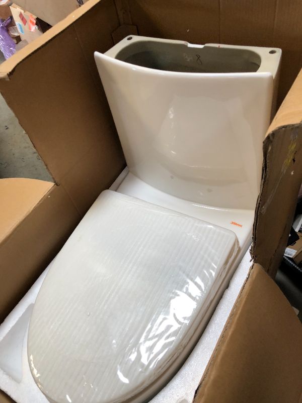 Photo 4 of St. Tropez One-Piece 14" Rough-in 1.1/1.6 GPF Dual Top Flush Elongated Toilet in Glossy White