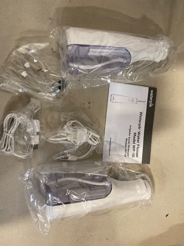 Photo 1 of Waterpik Cordless Select Water Flosser 2-pack