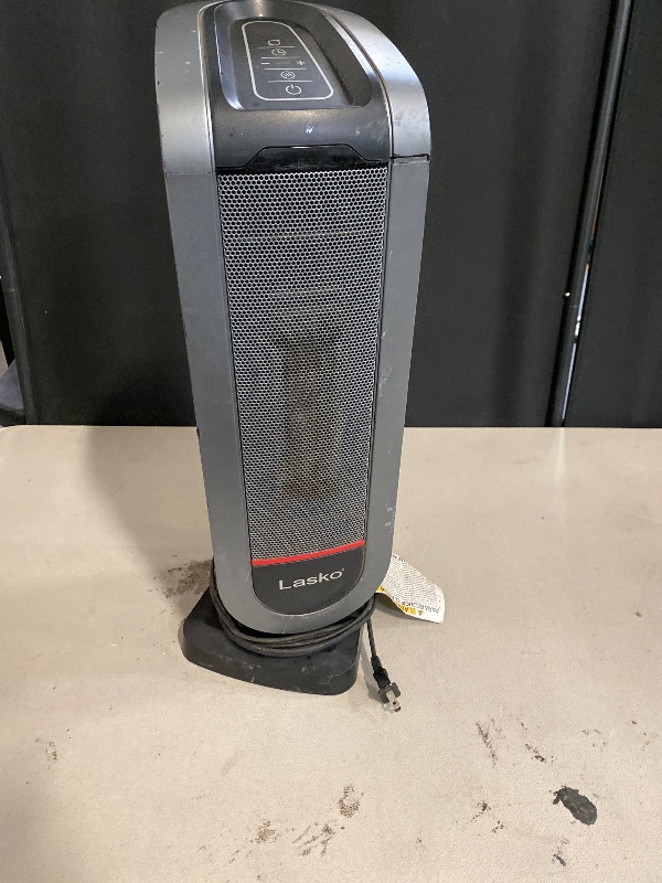 Photo 1 of Lasko Portable Oscillating Indoor Electric Ceramic Tower Space Heater with Tip-Over Safety Switch, Overheat Protection, Timer and Remote Control, Safe for Home, 22.5 Inches,1500W, 751321, Black