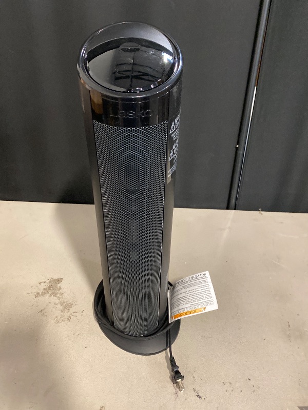 Photo 1 of Lasko - 22" Electric Ceramic Tower Heater with Timer and Powerful 1500W: Smart Heat for Your Home.