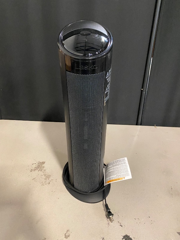 Photo 1 of Lasko - 22" Electric Ceramic Tower Heater with Timer and Powerful 1500W: Smart Heat for Your Home.