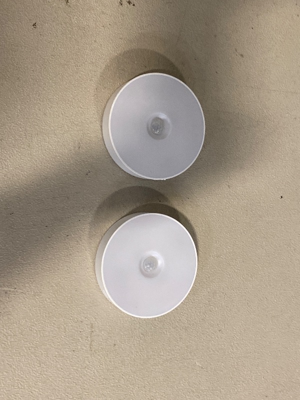 Photo 1 of EZVALO Under Cabinet Lighting,1000mAh Rechargeable Puck Lights with Remote,3 Color Temps & 12 RGB Motion Sensor Closet Lights Indoor,Dimmable Under Cabinet Lights for Kitchen,Cabinets,Close