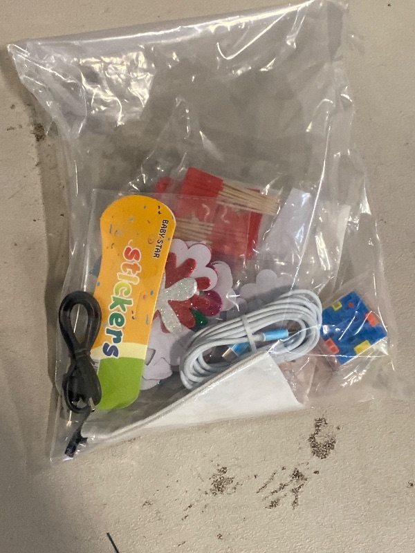 Photo 1 of Stickers,Chargers,and Makeup bag