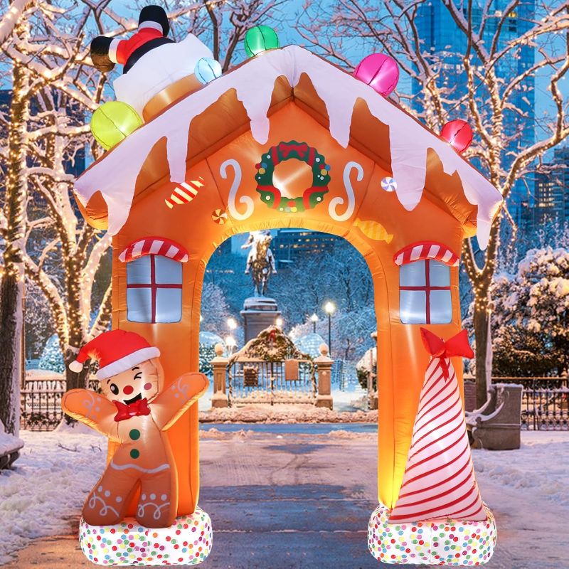 Photo 1 of 10 Ft Christmas Inflatables Decorations Outdoor, Built-in Colorful LEDs Xmas Blow Up Archway Decoration with Gingerbread Man, Candy, Santa Claus for Indoor Outdoor Yard