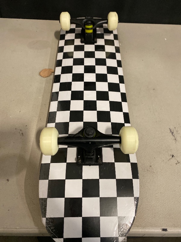 Photo 1 of WhiteFang Skateboards for Beginners, Complete Skateboard 31 x 7.88, 7 Layer Canadian Maple Double Kick Concave Standard and Tricks Skateboards for Kids and Beginners