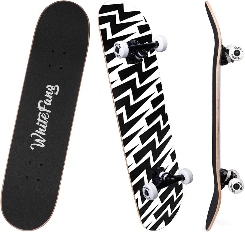 Photo 1 of WhiteFang Skateboards for Beginners, Complete Skateboard 31 x 7.88, 7 Layer Canadian Maple Double Kick Concave Standard and Tricks Skateboards for Kids and Beginners