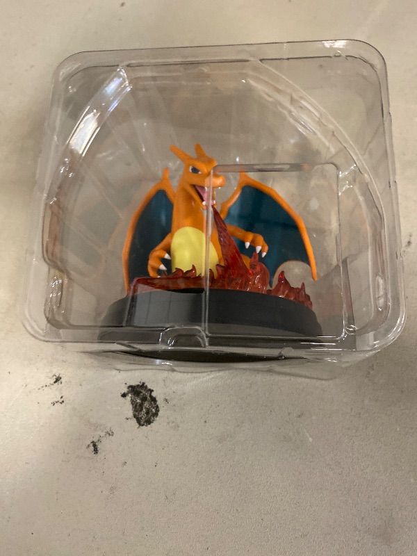 Photo 1 of Pokémon TCG: Charizard ex Super-Premium Collection (3 Foil Promo Cards, 1 Card-Display Figure & 10 Booster Packs)