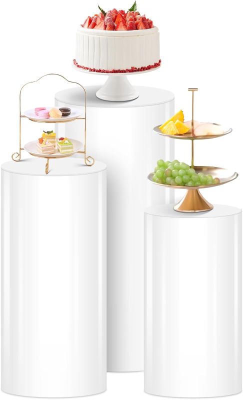 Photo 1 of White Cylinder Stands for Party 3Pcs Round Pedestal Stand for Parties, Pillars for Wedding Birthday Party Art Decor 35.43''(L),29.52''(M),23.62''(S)