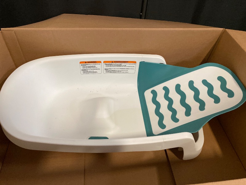 Photo 1 of The First Years Sure Comfort 4-in-1 Reclining Newborn to Toddler Baby Bathtub - White