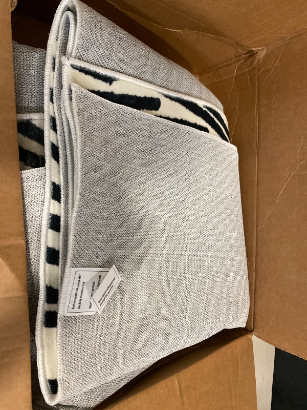 Photo 1 of Unique Loom Wildlife Collection Area Rug - Okapi (3' 3" x 5' 3" Rectangle Black/Cream)