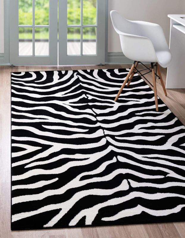 Photo 1 of Unique Loom Wildlife Collection Area Rug - Okapi (3' 3" x 5' 3" Rectangle Black/Cream)