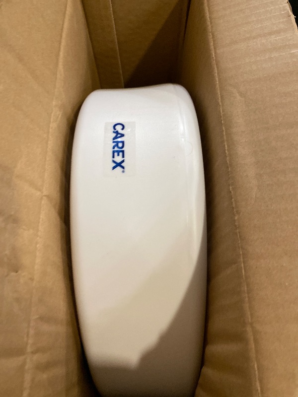 Photo 1 of Carex Toilet Seat Riser, Elongated Raised Toilet Seat Adds 3.5 inches to Toilet Height, for Assistance Bending or Sitting, 300 Pound Weight Capacity Toilet Riser