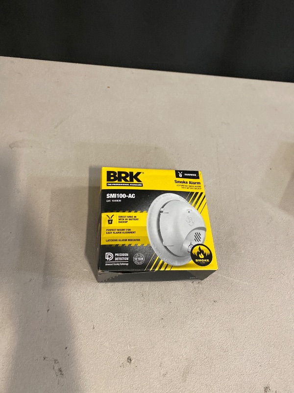 Photo 1 of SMI100-AC Hardwire Interconnect Smoke Alarm with Battery Backup,