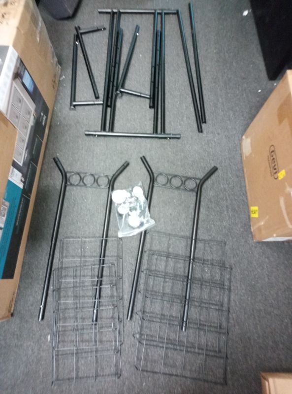 Photo 1 of Heavy Duty Clothes Rack, Rolling Clothing Rack With Shelves Load 620 LBS, Double Rod Clothing Racks for Hanging Clothes, Portable& Adjustable Clothes Rack with Wheels,Black