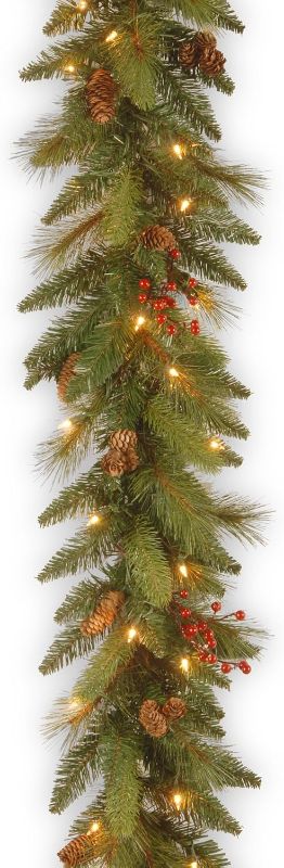 Photo 1 of National Tree Company Pre-Lit Artificial Christmas Garland, Green, Evergreen, White Lights, Decorated With Pine Cones, Berry Clusters, Plug In, Christmas Collection, 6.5 Feet
