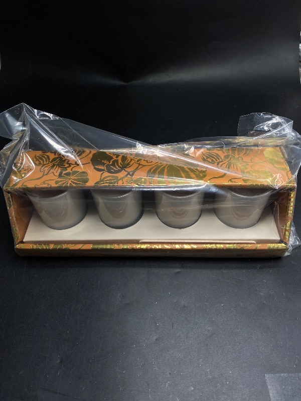 Photo 2 of HYOOLA- SCENTED CANDLES IN PLASTIC CUPS-VANILLA PUMPKIN- 4PACK 