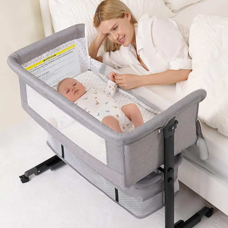 Photo 1 of Baby Bassinet, 3 in 1 Bassinet Bedside Sleeper, Adjustable Height Bedside Sleeper with Rocking Mode, Breathable Mesh, Storage Basket, Wheels, Easy Assemble & Folding (Gray)
