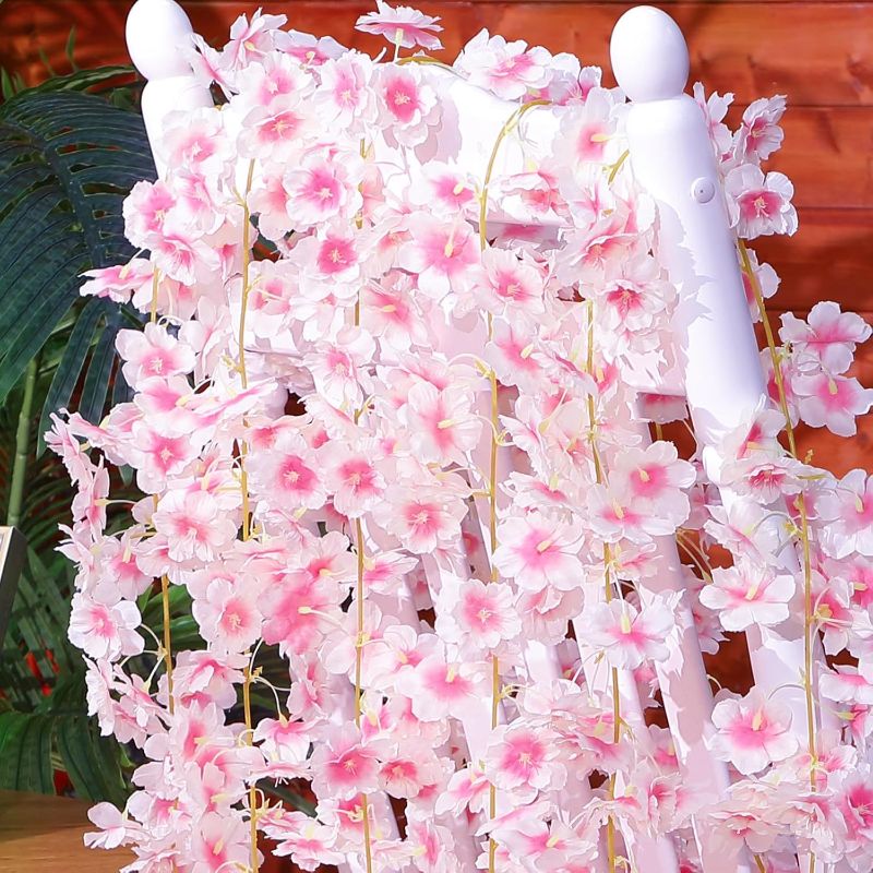 Photo 1 of Artificial Cherry Blossom Flower Vines Faux Flower Garland Hanging Silk Flowers Vines for Wedding Party Home Bedroom Decor Japanese Kawaii (Light Pink)