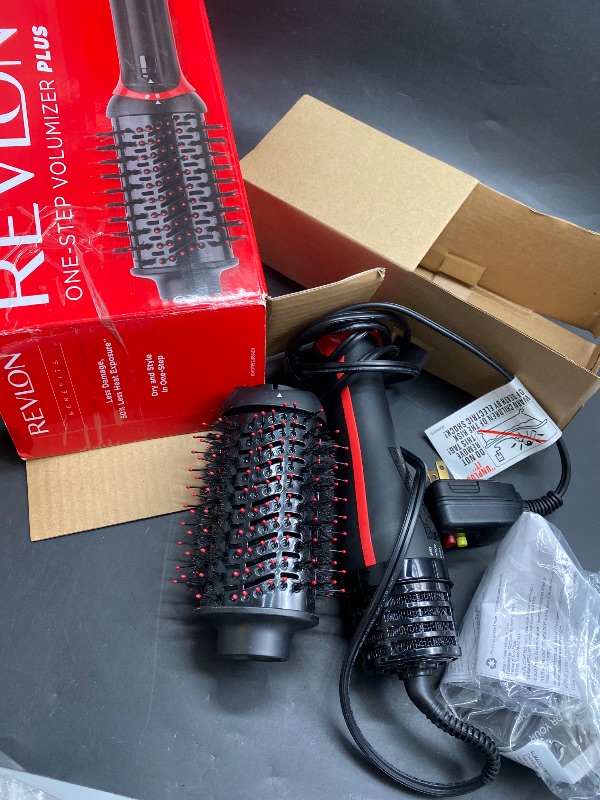 Photo 1 of REVLON One Step Volumizer PLUS Hair Dryer and Styler | More Volume, Less Damage, and More Styling Control for Easy and Fast Salon-Style Blowouts, Plus Travel Friendly (Black)
