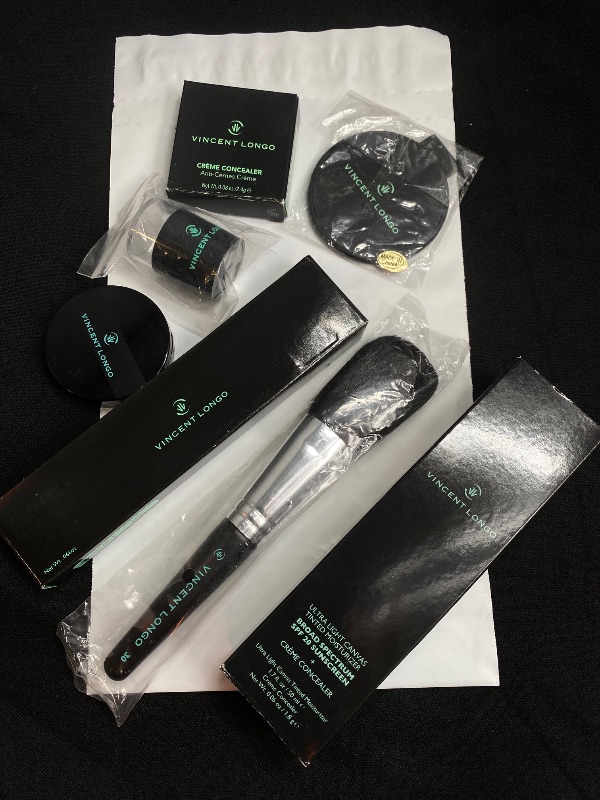 Photo 1 of Vincent Longo Cosmetics- 1 Ultra Light Canvas Tinted Moisturizer, 1 Eye Shadow, 1 Dark Illumina Concealer Pencil, 1 Cream Amber Concealer, 1 Powder Brush, 1 Sharpener, 1 Compact Mirror New