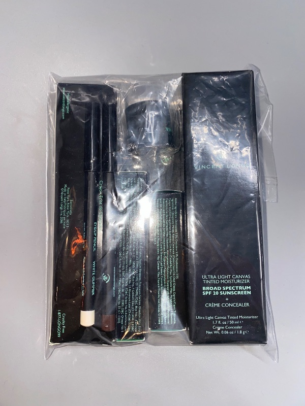 Photo 1 of Vincent Longo Cosmetics- 1 Ultra Light Tinted Moisturizer SHADE #4, 1 Illumina Concealer Pencil #3, 1 Wet Pearl Lipstick, 1 Lip/Cheek Gel Stain BABY BOO, 2 Eye/Lip Pencils, 1 Compact Mirror & 2 Sharpeners.