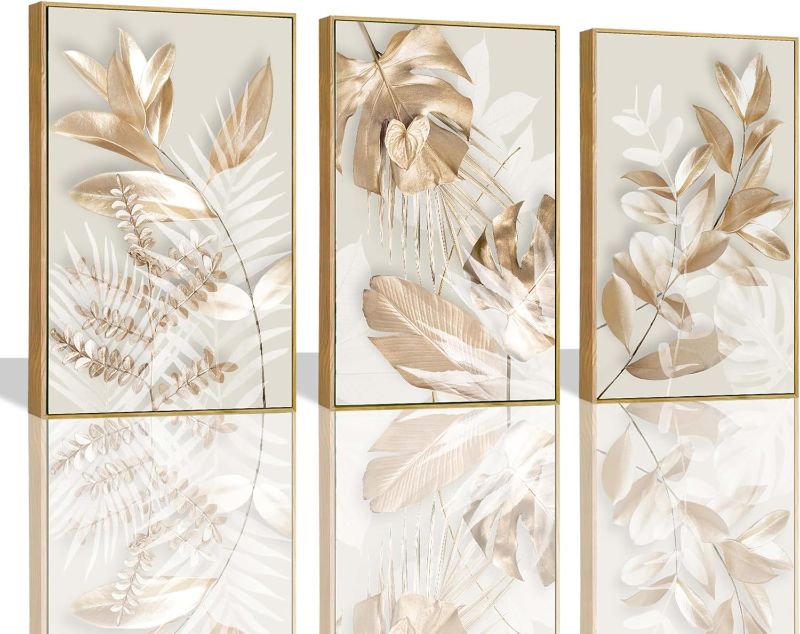 Photo 1 of Large Picture for Living Room 3 Pieces Modern Gold Flowers and Leaves Canvas Wall Pictures White and Gold Wall Art for Bedroom Decor Elegant Wall Decor Set of 3 Wall Art Framed 20x28inches x3pcs
