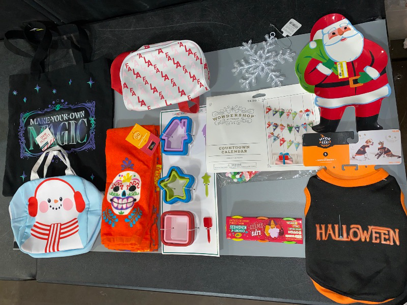 Photo 2 of LOT OF 10 MISCELLANEOUS ITEMS. Small Halloween Dog/Cat Sweatshirt, Paper Pennant Countdown Banner, Wicked Tote Bag, Sandwich Cutter Set of 9Pc, Snowflake Christmas Tree Ornament, Santa Dinner Plate, Waist Pouch, Hand Towels, Snowmen Lunch Bag, 