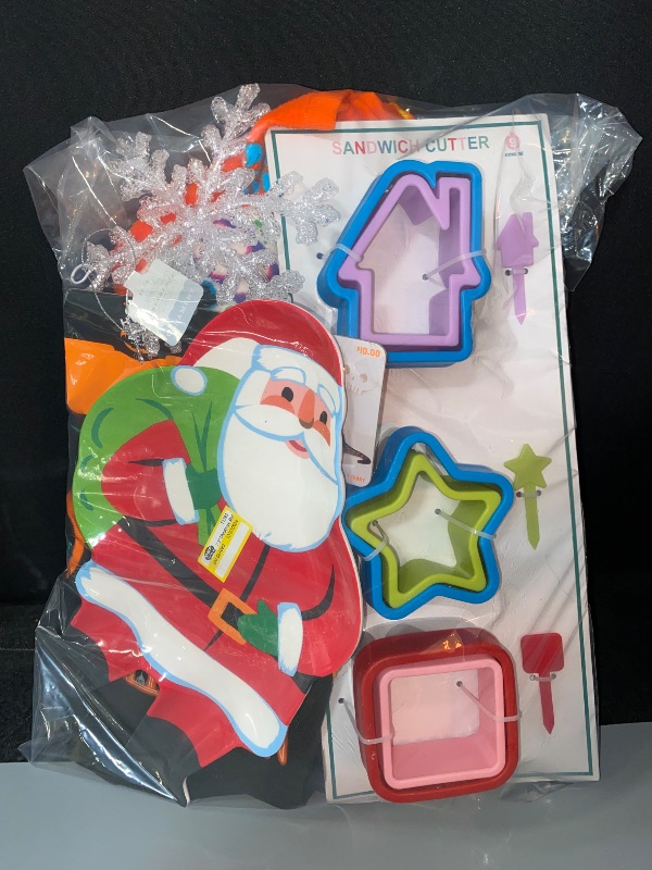 Photo 3 of LOT OF 10 MISCELLANEOUS ITEMS. Small Halloween Dog/Cat Sweatshirt, Paper Pennant Countdown Banner, Wicked Tote Bag, Sandwich Cutter Set of 9Pc, Snowflake Christmas Tree Ornament, Santa Dinner Plate, Waist Pouch, Hand Towels, Snowmen Lunch Bag, 