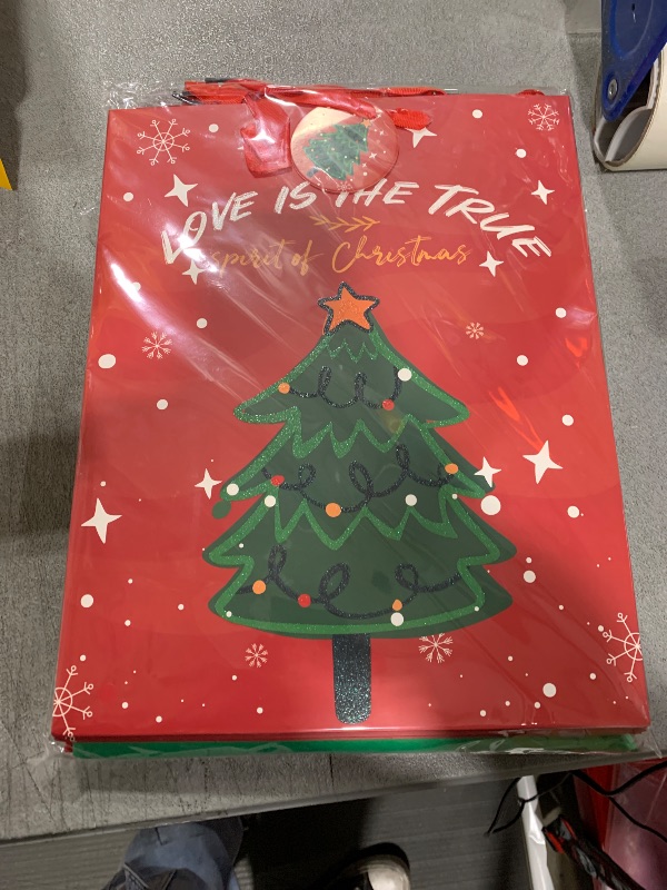 Photo 1 of 12Pack Christmas Gift Bags Assorted Sizes With Tissue paper(12 Bags: 4 Small 6", 4 Medium 9", 4 Large 13") for Friends, Family, Teachers, Coworkers, Christmas Gift Bags Assorted Sizes Bulk Set