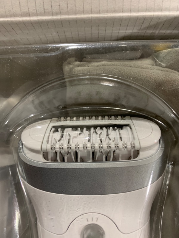 Photo 1 of Braun Epilator Silk-épil 7, Hair Removal Device, Women Shaver & Trimmer, Wet and Dry, Wide Head, Includes Shaver Head and Trimmer Comb, SE7-041, Silver