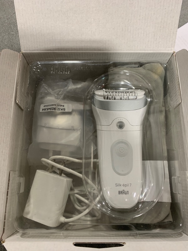 Photo 1 of Braun Epilator Silk-épil 7, Hair Removal Device, Women Shaver & Trimmer, Wet and Dry, Wide Head, Includes Shaver Head and Trimmer Comb, SE7-041, Silver