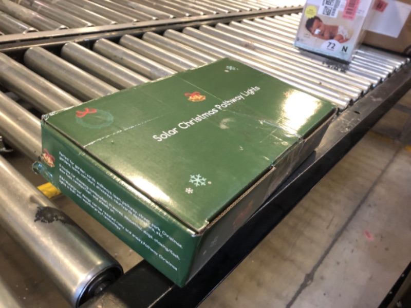 Photo 1 of Solar Christmas Pathway Lights, Solar Tree Lights Christmas Decorations Outdoor, Waterproof Christmas Garden Stake Lights for Patio, Yard, Garden, Lawn Christmas Holiday Decor, 4 Pack(Multicolor)