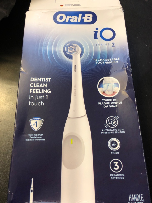 Photo 1 of Oral-B iO Series 2 Rechargeable Electric Powered Toothbrush, Pure White with 1 Gentle Care Brush Head - Automatic Pressure Sensor to Protect Gums - 3 Modes - 2 Min Timer