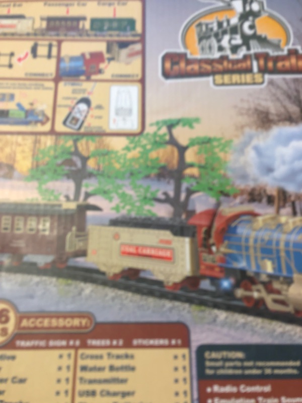 Photo 1 of JUQU Train Set for Boys -Remote Control Train Toys-Electric Train w/Smokes, Steam Locomotive w/Lights & Sound, Cargo Car and Tracks, Rechargeable Battery Christmas Toy Train for Age 3 4 5 6 7 8+ Kids